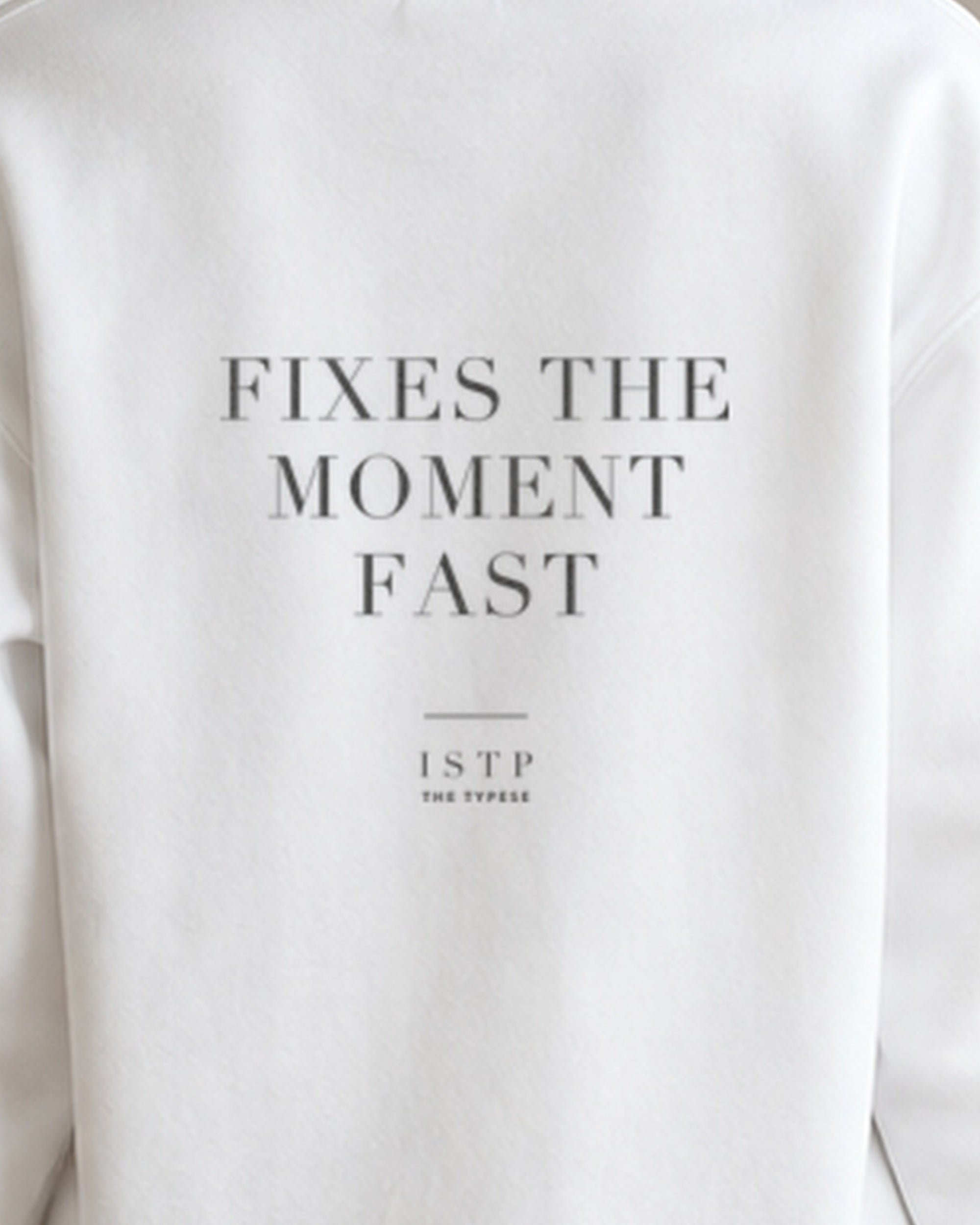 The Typese ISTP Gildan crewneck sweatshirt in white, female back print close